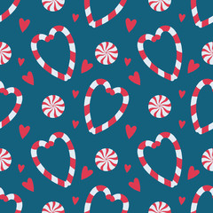 Heart shaped candy cane and peppermint candy cartoon style seamless pattern