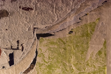 All layers are torn off at the advertising column