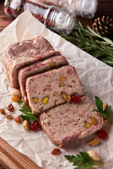 Terrine of ground meat, ham, raisins, pistachios
