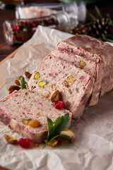 Terrine of ground meat, ham, raisins, pistachios