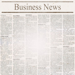 Obraz premium Newspaper with headline Business News and old unreadable text