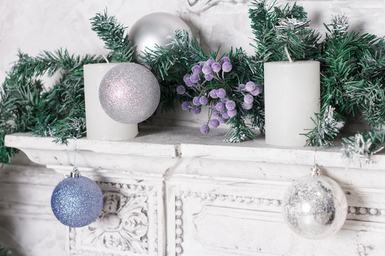 New Year's scenery from a fir-tree, a candle and toys