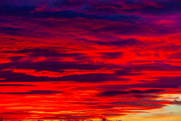 Picturesque dramatic colorful vibrant sunset sky with clouds