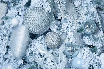 Christmas balls on fir tree. New Year holidays and Christmastime celebration.