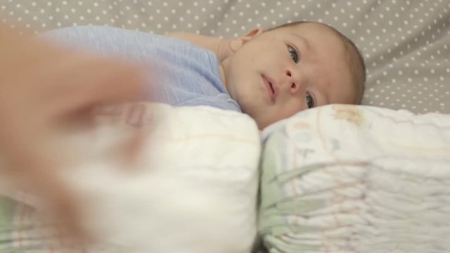 Stack of baby disposable diapers.