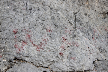 Weathered stone texture background. Distressed stone surface. Rustic concrete design template. Cracked rock surface.