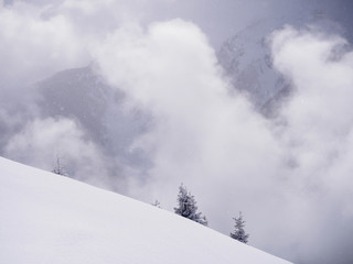 Sunshine and snowfall in the mountains