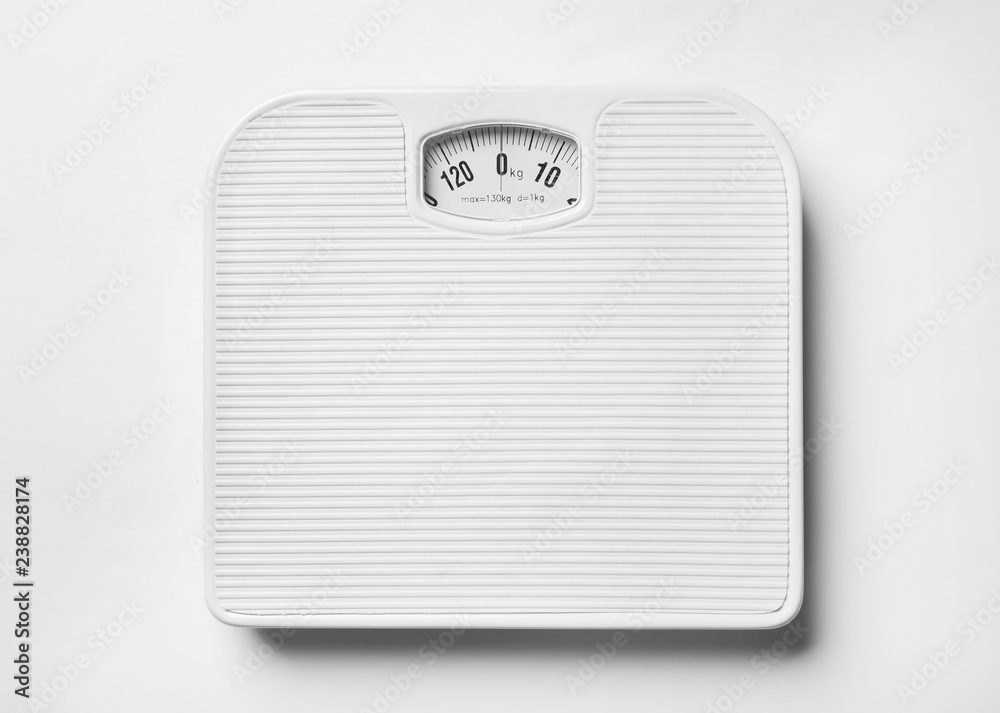 Poster Bathroom scales on white background, top view. Weight loss concept