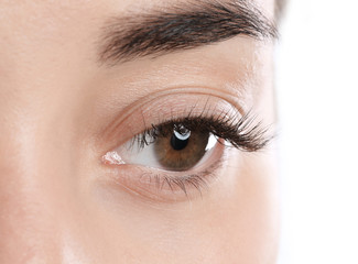 Obraz premium Young woman with beautiful eyelashes, closeup view