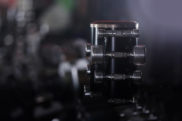 Modern sports equipment in gym. Space for text