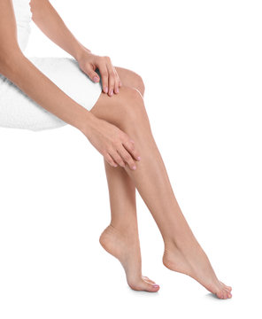 Woman with beautiful legs and feet on white background, closeup. Spa treatment