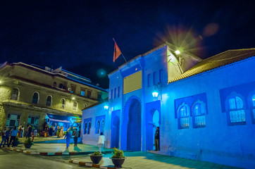 Naklejka premium Beautiful street of city Chefchaouen at night in Morocco, Africa.