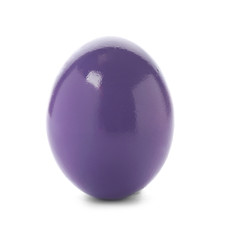 Dyed Easter egg on white background. Festive tradition