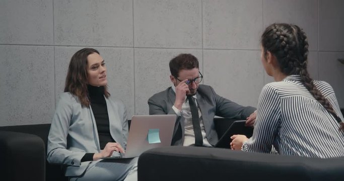HR managers interviewing female job employee, have positive first impression of candidate, happy employers listen to applicant at interview excited of candidature. Recruitment concept. 4K UHD