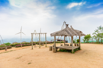vintage swing with flower garden