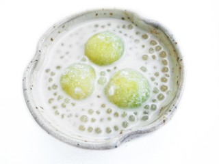 Dessert cantaloupe melon and coconut milk on isolated white background