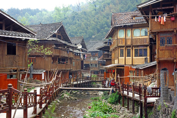 Fototapeta na wymiar Zhaoxing Dong Zai ancient town in the morning mist, Guizhou province China. Selective and soft focus.
