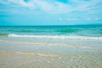 empty sand beach with wave summer the ocean blue water background