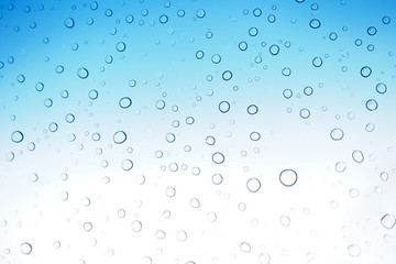 Fototapeta na wymiar Abstract Water drops on blue glass Background - Image