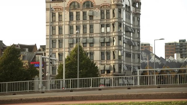 jogger running on bridge in front of Witte Huis