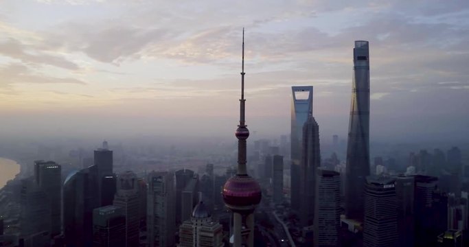 Aerial shot of Shanghai city skyline during sunrise