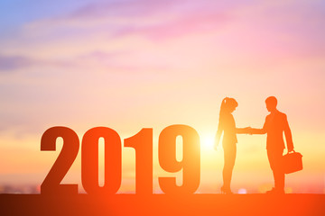 silhouette of people with 2019