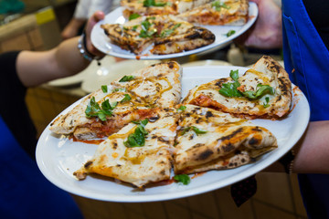 Pizza napoletana in Roma ready to be eaten