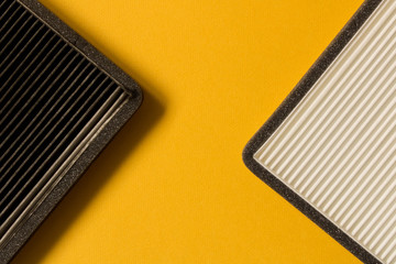 New and old car air filter. Close up.