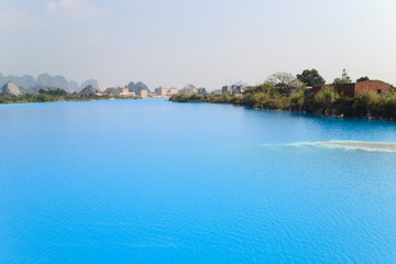 Fototapeta na wymiar Tuyet Tinh Coc lake , Natural color Crystal Blue lake at Trai Son mountain, Hai phong, Vietnam