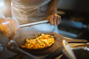 Preparing traditional Italian pizza. Healthy Italian food.