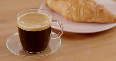 Croissant and hot coffee