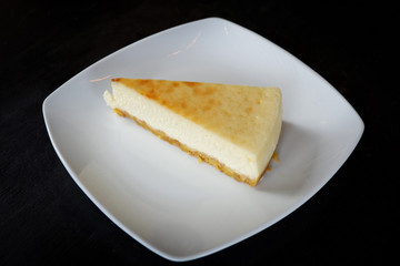 milk cake sweet food / piece of dessert delicious top view milk cake vanilla plate