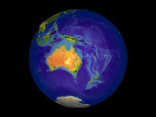 Australia from space on model of planet Earth with country borders. Very fine detail of the plastic planet surface and oceans.