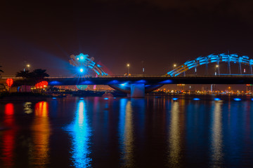 Fototapeta na wymiar Colorful Da nang dragon bridge at night