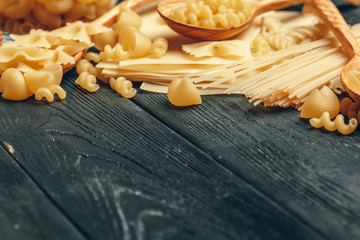 Various pasta on spoons