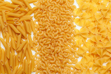 Uncooked pasta spaghetti macaroni isolated on white background