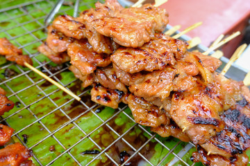Moo Ping or Thai grilled pork skewers