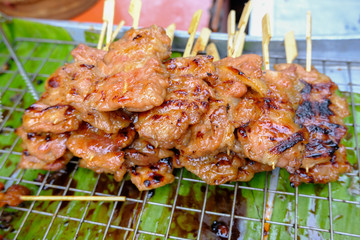 Moo Ping or Thai grilled pork skewers