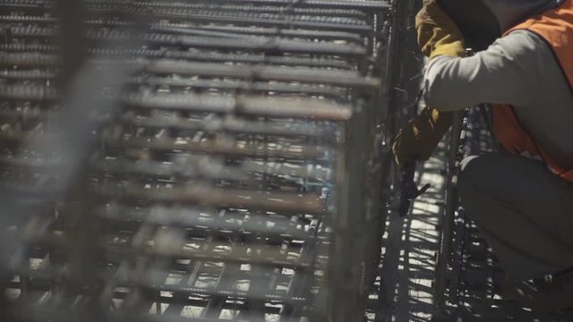 Welder welds reinforcement