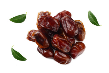 date fruits with green leaves isolated on white background. top view