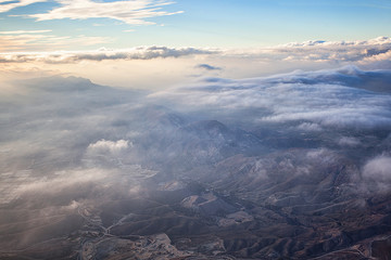 Obraz na płótnie Canvas Aerial view of a beautiful mountain range at Southern California.