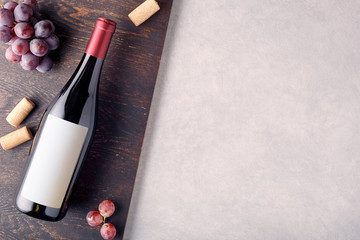 Bottle of red wine with label.