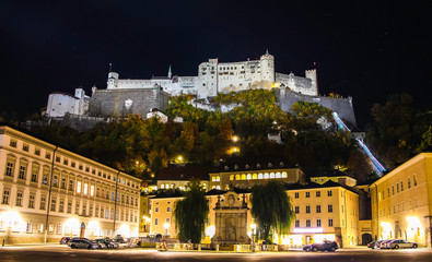 Fototapeta na wymiar Beautiful view on illuminated Salzburg Castle during Austrian fall night