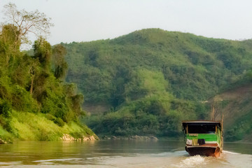 Slow boat on the Mekong river Laos