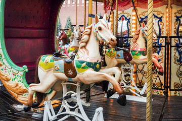 Fototapeta na wymiar Bright carousel at the Christmas fair in Moscow.