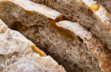 Sliced bread on a wooden table.