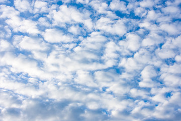 The beauty of the sky with clouds and the sun.