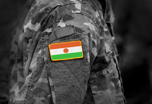 Flag Of Niger  On Soldiers Arm (collage).