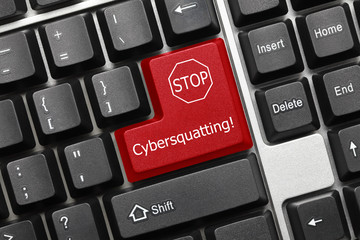 Conceptual keyboard - Cybersquatting (red key with STOP sign)