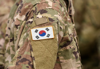 Flag of South Korea on soldiers arm (collage).